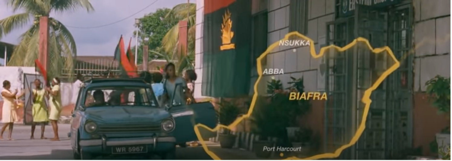 Fig. 1 - Map of Biafra superimposed on a street scene (1:02:20).